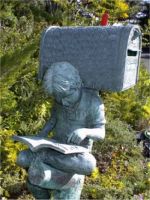 Boy Reading Book Mailbox